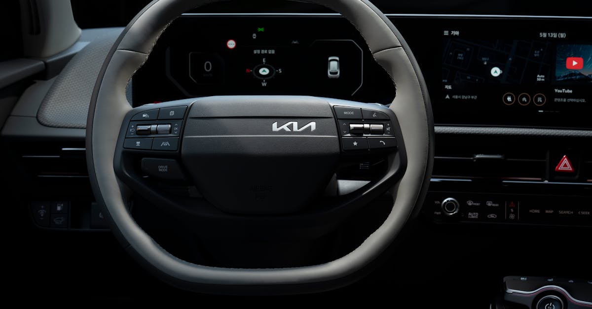 Close-up view of the Kia EV's steering wheel showcasing its modern design and technology.